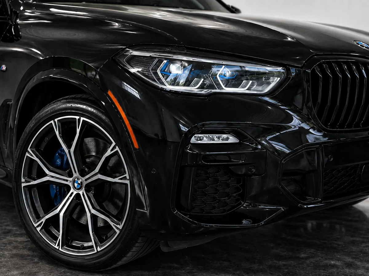 BMW headlight and wheel detail showing tight finish